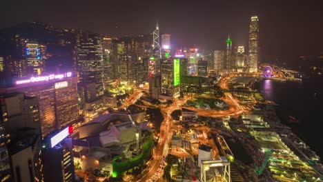 China-Sonnenuntergang-Nacht-Licht-Hong-Kong-auf-dem-Dach-Verkehr-Bucht-Stadtpanorama-4k-Zeitraffer