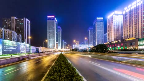 Zeitraffer-von-Wuhan-City-bei-Nacht,-China