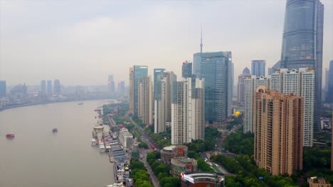 China-día-shanghai-panorama-aéreo-paisaje-fluvial-4k