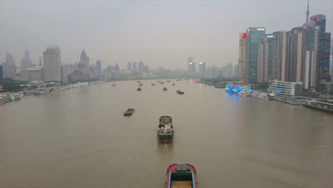 china-twilight-shanghai-traffic-huangpu-river-cityscape-aerial-panorama-4k