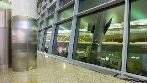 wuhan-city-airport-window-reflection-hall-panorama-4k-timelapse-china