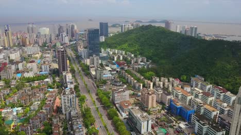 día-soleado-zhuhai-paisaje-urbano-tráfico-camino-Bahía-panorama-aéreo-4k-de-china