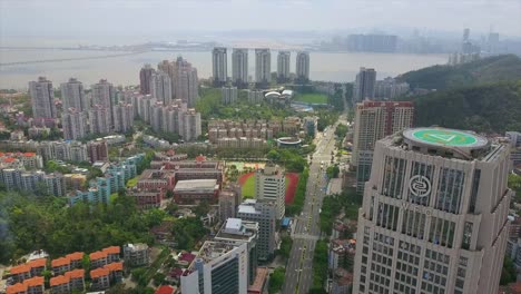 Tag-Zeit-Zhuhai-Stadtbild-Verkehr-Straße-Mehrfamilienhäuser-Bau-aerial-Panorama-4k-china