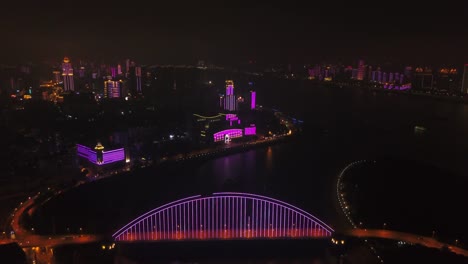 noche-iluminada-wuhan-ciudad-riverside-hotel-puente-aéreo-panorama-4k-china