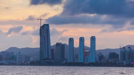 china-sunset-sky-zhuhai-cityscape-bay-hotel-construction-panorama-4k-timelapse