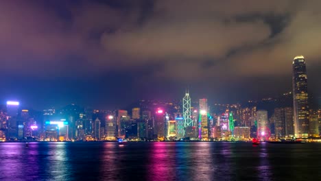 Night-imelapse-of-illuminated-Hong-Kong-skyline.-Hong-Kong,-China