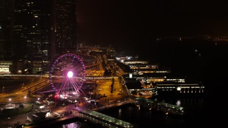 Horizonte-de-tiempo-de-noche-fantástica-con-rascacielos-iluminados.-Stock.-Vista-elevada-del-centro-de-Dubai,-Emiratos-Árabes-Unidos.-Fondo-colorido-viaje