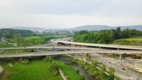 switzerland-zurich-riverside-traffic-road-junction-aerial-panorama-4k