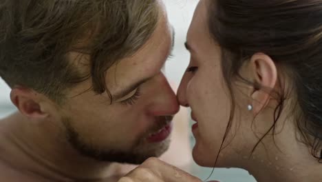 Tender-Couple-Relaxing-in-Swimming-Pool