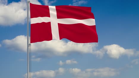 Flag-of-Denmark-against-background-of-clouds-floating-on-the-blue-sky