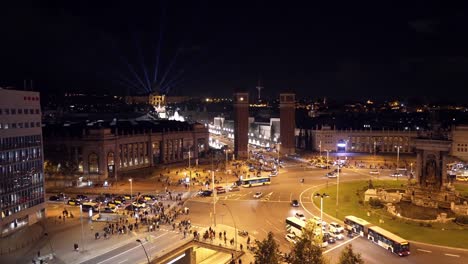 Plaza-de-Espana-in-Barcelona,-top-view-at-night,-traffic-lights