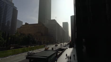 Low-angle-moving-shot-of-modern-financial-district-downtown-Los-Angeles,-California