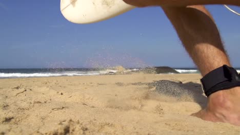 SLOW-MOTION:-Surfer-running-into-the-ocean