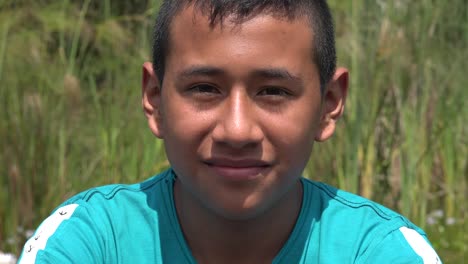 Teenage-Boy-Smiling-Outdoors