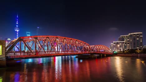 iluminación-nocturna-de-China-Shangai-panorama-de-puente-Bahía-de-río-centro-ciudad-4k-lapso-de-tiempo