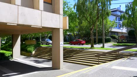 Modern-Architecture-Building-Close-Up,-Street-Road-Traffic-in-Background-City