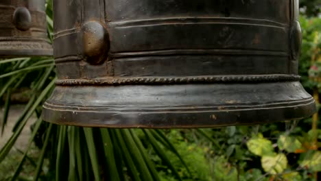 Mallet-for-sacral-gong-bell-in-Wat-Saket-Ratcha-Wora-Maha-Wihan-the-Golden-Mount.-Bangkok,-Thailand