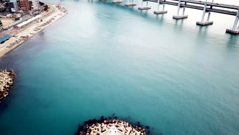 Gwangan-Brücke-und-Haeundae-Luftbild-bei-Sonnenaufgang,-Busan,-Südkorea.