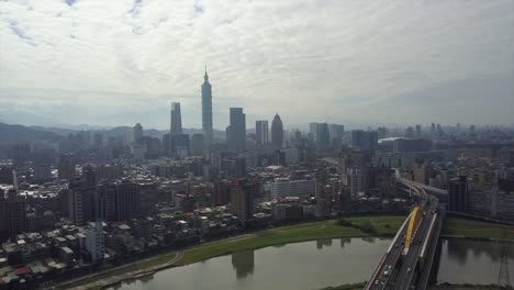 taiwan-taipei-cityscape-sunny-day-traffic-road-and-river-bridge-downtown-aerial-panorama-4k