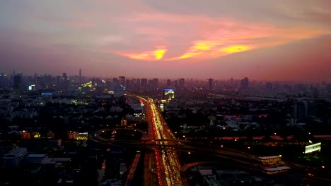 Fly-over-to-traffic-in-highway-at-night,-4k-video