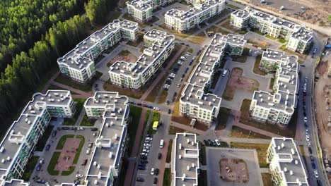 Aerial-view-on-modern-residential-homes-near-forest-edge