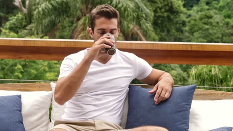 Guy-relaxing-with-coffee