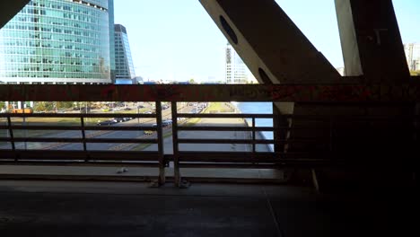 view-of-the-city-from-inside-the-spatial-structure-of-the-steel-bridge