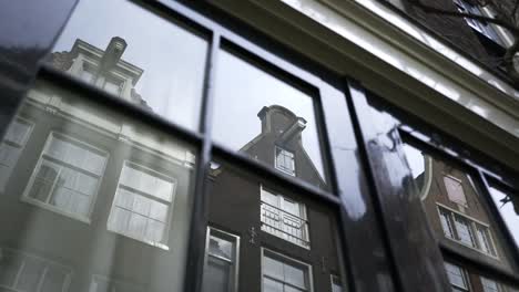 Dutch-Building-reflected-in-window.