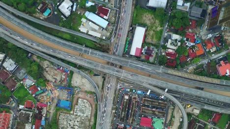 kuala-lumpur-downtown-traffic-road-junction-aerial-topdown-panorama-4k-malaysia