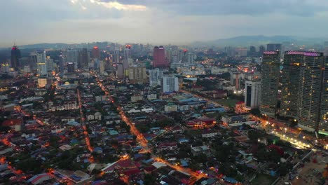 evening-illumination-kuala-lumpur-cityscape-famous-living-block-aerial-panorama-4k-malaysia