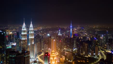 noche-iluminación-kuala-lumpur-aérea-abajo-vista-timelapse-4k-Malasia