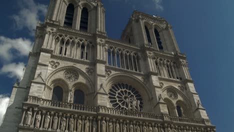 tilt-shot-of-Notre-Dame-Church,-Paris-,entrance-to-towers