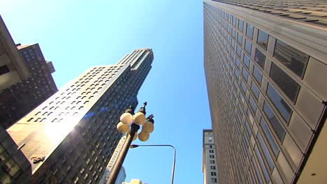 low-angle-HD-pan-of-multiple-skyscrapers