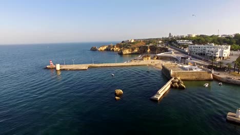 Harbor-and-Fort-Lagos,-Algarve,-Portugal-aerial-view