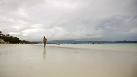 Man-running-on-the-beach