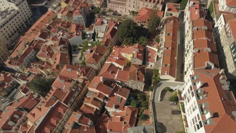 portugal-sunny-day-lisbon-cityscape-rooftops-aerial-panorama-4k