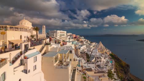 sunset-time-santorini-island-famous-fira-town-cityscape-bay-panorama-4k-time-lapse-greece