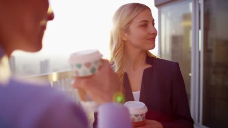 Positive-multi-ethnic-business-team-during-break-time