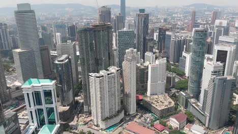 Aerial-footage-of-high-rise-buildings-in-Kuala-Lumpur,-Malaysia.-FullHD-Drone-video.