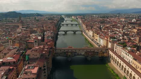 Aerial-View-of-Florence,-Italy,-The-Ponte-Vecchio-Old-Bridge-,-Arno-River-4K