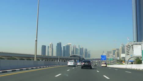 Luz-de-día-de-la-ciudad-de-dubai,-Emiratos-Árabes-Unidos-principal-viaje-tráfico-4-K