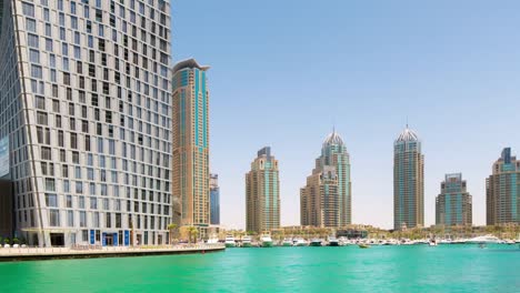 Uae-summer-day-dubai-marina-cayan-tower-panoramic-view-4k-time-lapse