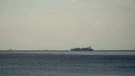 Cargo-ship-sails-on-the-sea.-Philippines,-Manila