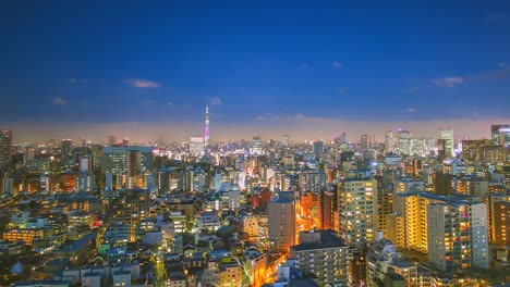 4K.-Vista-en-tiempo-de-lapso-de-la-ciudad-de-Tokio-en-Nigh-twith-torre-de-Tokio-en-Japón