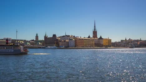 Timelapse-video-of-Stockholm-city-skyline-with-sea-and-ferry-in-Sweden,-time-lapse-4K