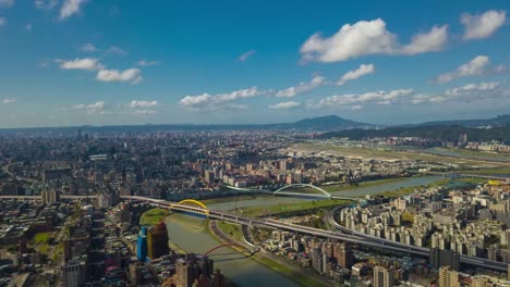 Río-de-paisaje-urbano-de-día-soleado-taipei-aérea-panorama-4k-timelapse-Taiwán