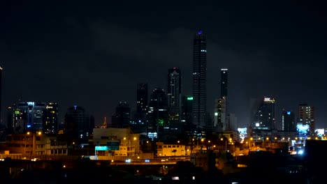 Smart-city.-Financial-district-and-skyscraper-buildings.-Aerial-view-of-Bangkok-downtown-area-at-night,-Thailand.