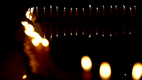 Candle-fire-flame-slow-motion-in-celebration-and-meditating-on-night-day