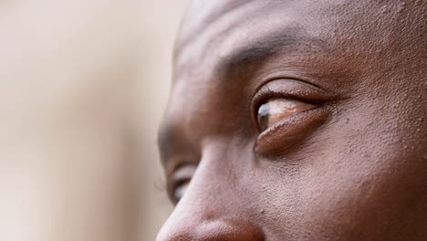 Black-african-man-'s-eyes-looking-around--macro