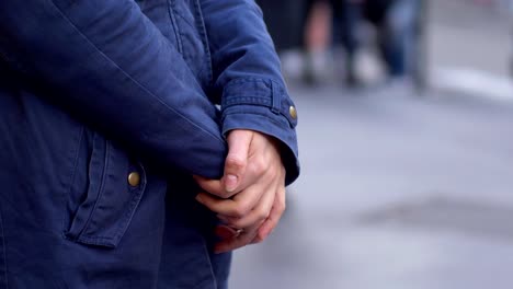 Nervous-woman-hands-in-the-street-waiting-for-someone---first-date,-emotions